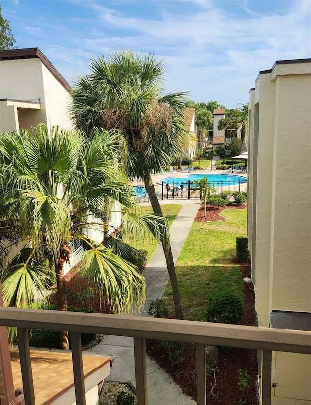 2205 Belleair Rd Unit A36, Clearwater, FL 33764 - view of yard featuring a community pool