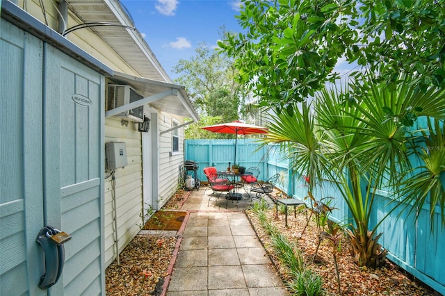 556 Virginia St, Dunedin, FL 34698 - view of patio / terrace with a fenced backyard