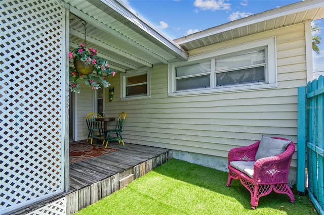 556 Virginia St, Dunedin, FL 34698 - view of grassy yard with a deck