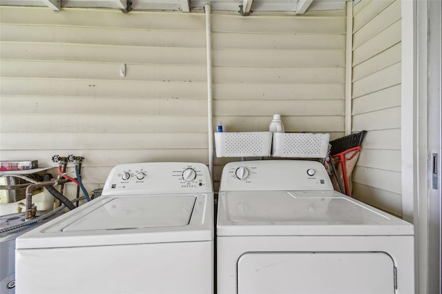 556 Virginia St, Dunedin, FL 34698 - washroom featuring washing machine and clothes dryer