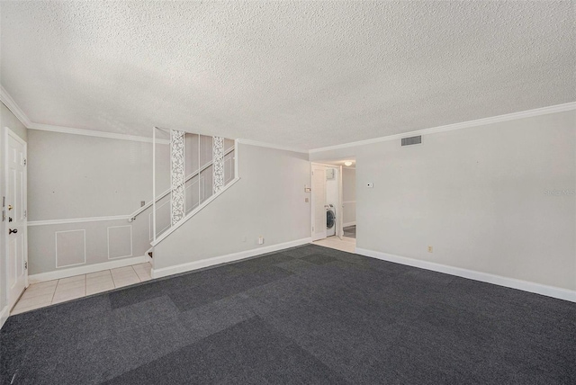 unfurnished room with stairway, washer / dryer, crown molding, baseboards, and a textured ceiling