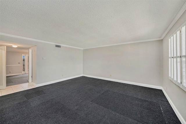 unfurnished room with healthy amount of natural light, crown molding, a textured ceiling, and baseboards