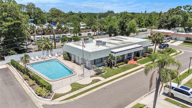 drone / aerial view of a pool