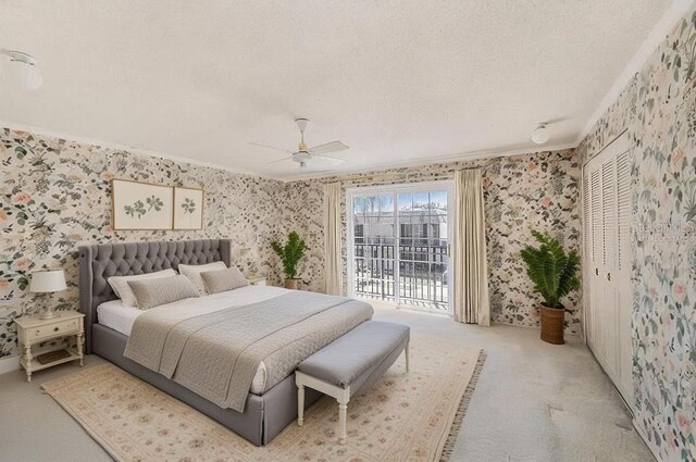 202 Mindy Dr, Largo, FL 33771 - carpeted bedroom featuring wallpapered walls, ornamental molding, a textured ceiling, ceiling fan, and a closet