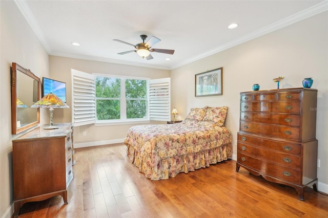 bedroom featuring ornamental molding, light wood-type flooring, baseboards, recessed lighting, and a ceiling fan
