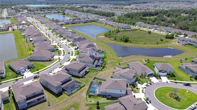 aerial perspective of suburban area featuring a large body of water