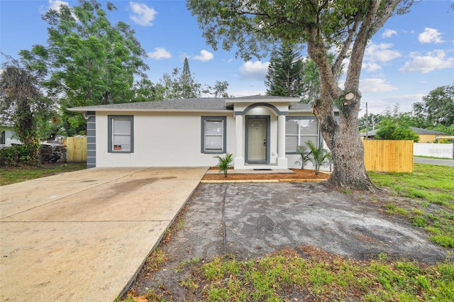 1801 E Navajo Ave, Tampa, FL 33612 - single story home featuring stucco siding and fence
