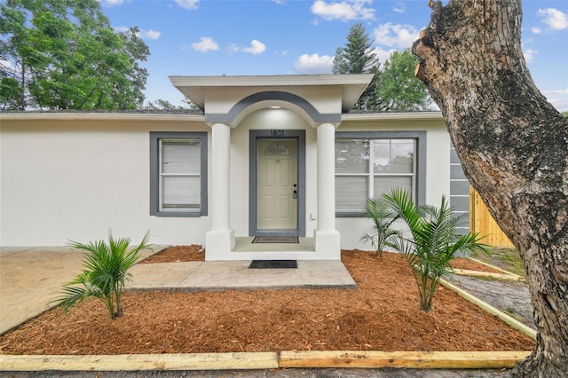 1801 E Navajo Ave, Tampa, FL 33612 - property entrance featuring stucco siding