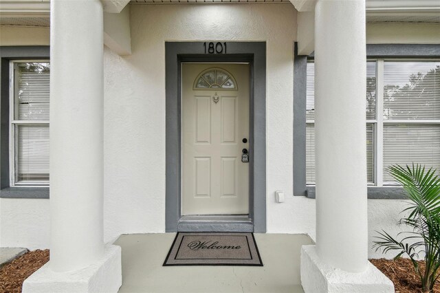 1801 E Navajo Ave, Tampa, FL 33612 - entrance to property featuring stucco siding