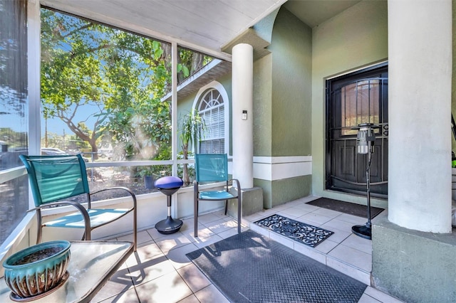 1505 E 99th Ave, Tampa, FL 33612 - doorway to property featuring stucco siding