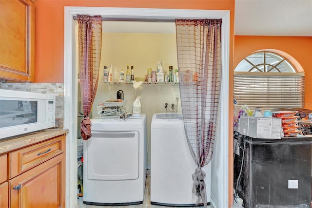 1505 E 99th Ave, Tampa, FL 33612 - laundry room with washing machine and clothes dryer