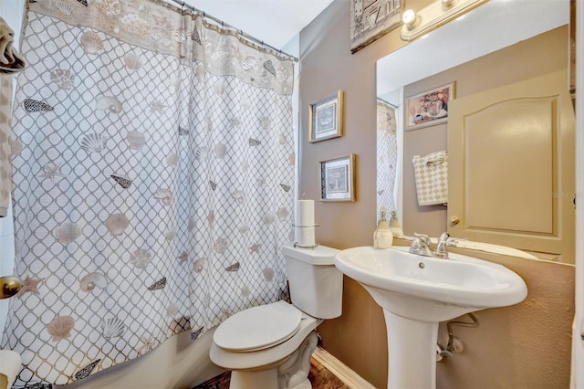1505 E 99th Ave, Tampa, FL 33612 - bathroom with toilet and shower / bath combo with shower curtain