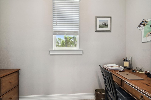 office area featuring baseboards