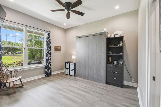 sitting room with ceiling fan, wood finished floors, baseboards, and recessed lighting