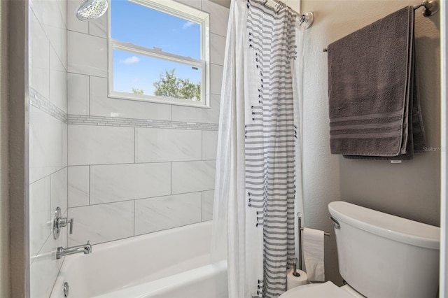 full bathroom featuring toilet and shower / tub combo with curtain