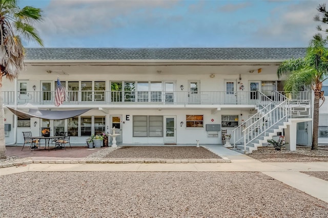 1221 Drew St Unit E12, Clearwater, FL 33755 - view of property with stairs