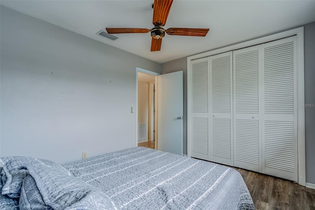 1221 Drew St Unit E12, Clearwater, FL 33755 - bedroom featuring wood finished floors, a closet, and ceiling fan