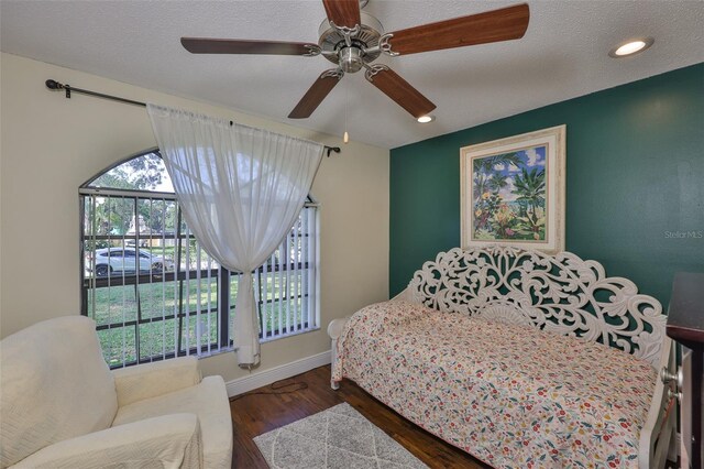 22115 Laver Ln, Land O Lakes, FL 34639 - bedroom with wood finished floors, baseboards, ceiling fan, and recessed lighting