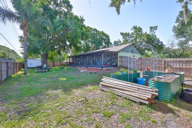 22115 Laver Ln, Land O Lakes, FL 34639 - view of yard with a sunroom, an outbuilding, and a shed