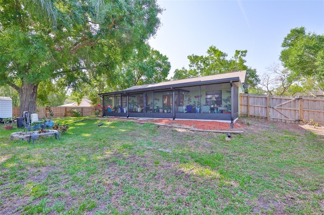 22115 Laver Ln, Land O Lakes, FL 34639 - rear view of house with a sunroom