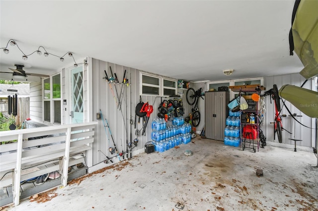 361 Colonial Ct, Dunedin, FL 34698 - garage with a ceiling fan