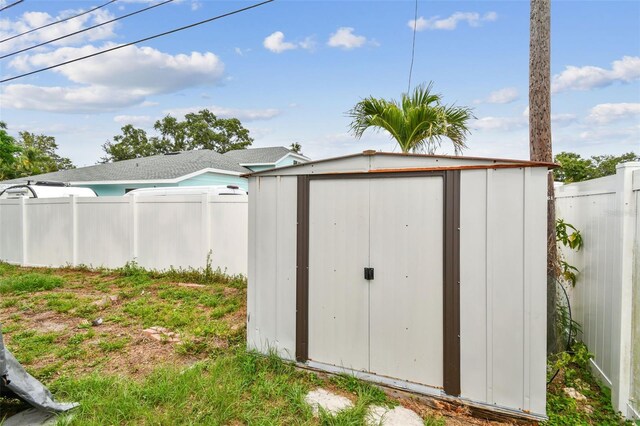 361 Colonial Ct, Dunedin, FL 34698 - view of shed featuring a fenced backyard