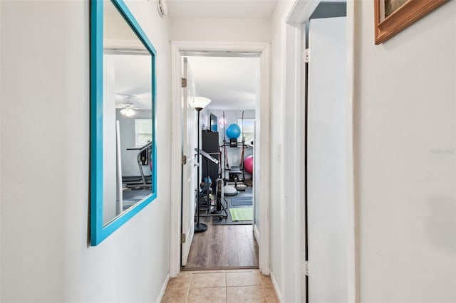 361 Colonial Ct, Dunedin, FL 34698 - hallway with tile patterned floors and baseboards