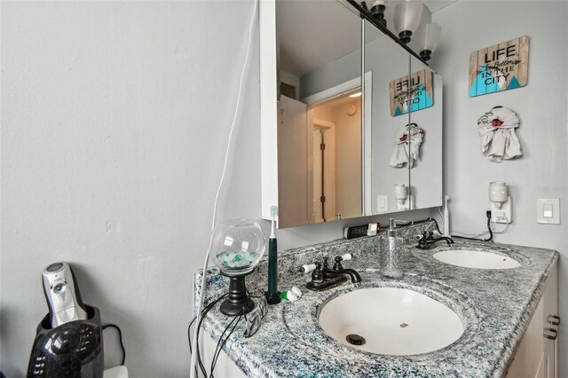 361 Colonial Ct, Dunedin, FL 34698 - bathroom featuring double vanity