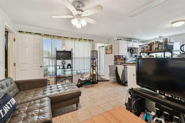 361 Colonial Ct, Dunedin, FL 34698 - living area featuring light tile patterned floors and ceiling fan