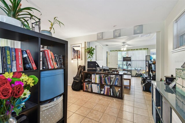 361 Colonial Ct, Dunedin, FL 34698 - kitchen with ceiling fan and tile patterned flooring