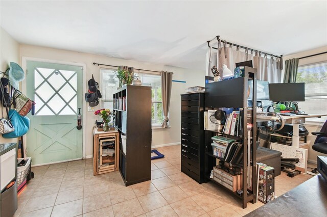 361 Colonial Ct, Dunedin, FL 34698 - office area with light tile patterned floors and baseboards