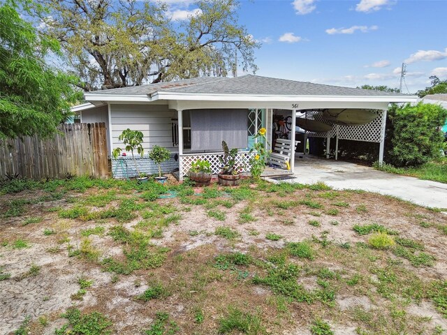 361 Colonial Ct, Dunedin, FL 34698 - view of front of house featuring driveway and an attached carport