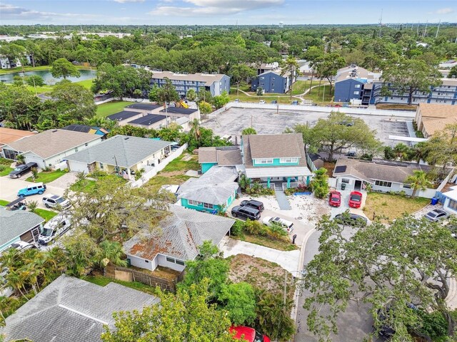 361 Colonial Ct, Dunedin, FL 34698 - aerial perspective of suburban area with a large body of water
