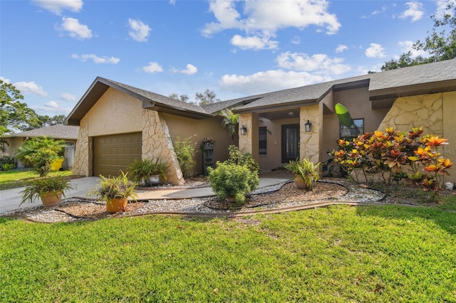 854 Village Way, Palm Harbor, FL 34683 - view of front of home featuring a garage, a front lawn, driveway, and stucco siding