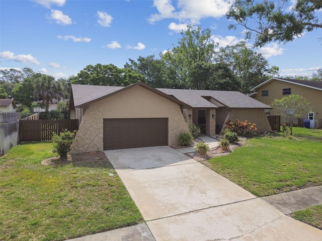 854 Village Way, Palm Harbor, FL 34683 - view of front of house featuring an attached garage, driveway, and stucco siding