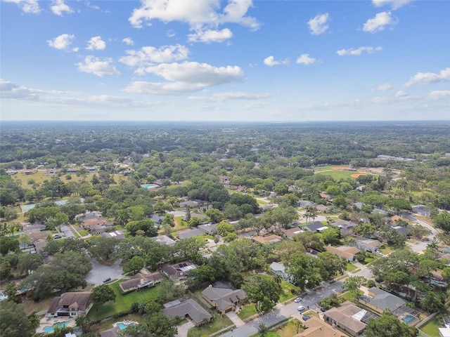 854 Village Way, Palm Harbor, FL 34683 - aerial view of residential area featuring a heavily wooded area