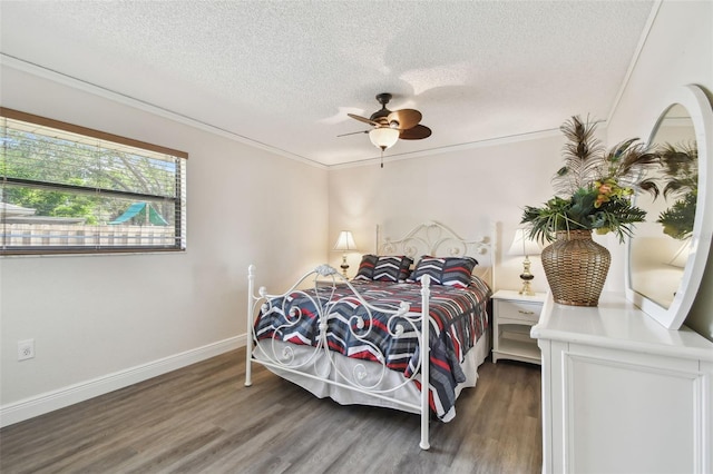 854 Village Way, Palm Harbor, FL 34683 - bedroom featuring a textured ceiling, wood finished floors, ornamental molding, baseboards, and ceiling fan