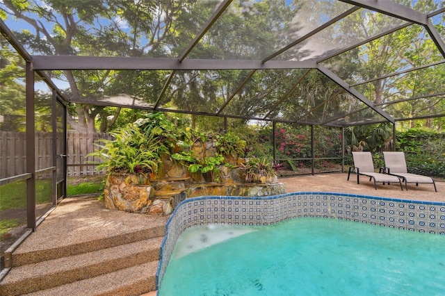 854 Village Way, Palm Harbor, FL 34683 - view of swimming pool with a patio area, fence, and a lanai