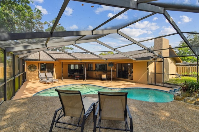 854 Village Way, Palm Harbor, FL 34683 - outdoor pool featuring a patio and a lanai