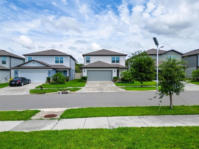 9324 Rally Spring Loop, Wesley Chapel, FL 33545 - traditional home with driveway and a front lawn