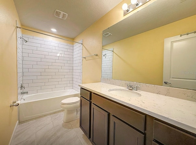 9324 Rally Spring Loop, Wesley Chapel, FL 33545 - full bath featuring toilet, vanity, washtub / shower combination, and tile patterned flooring