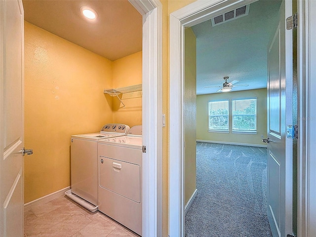 9324 Rally Spring Loop, Wesley Chapel, FL 33545 - washroom featuring separate washer and dryer, baseboards, and a ceiling fan