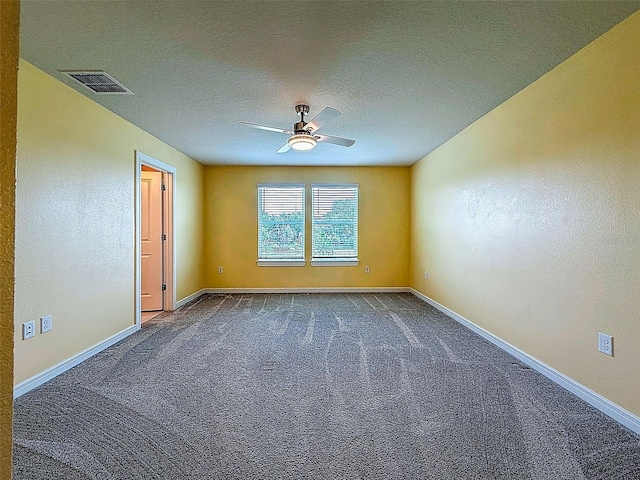 9324 Rally Spring Loop, Wesley Chapel, FL 33545 - carpeted empty room featuring a ceiling fan, baseboards, and a textured ceiling