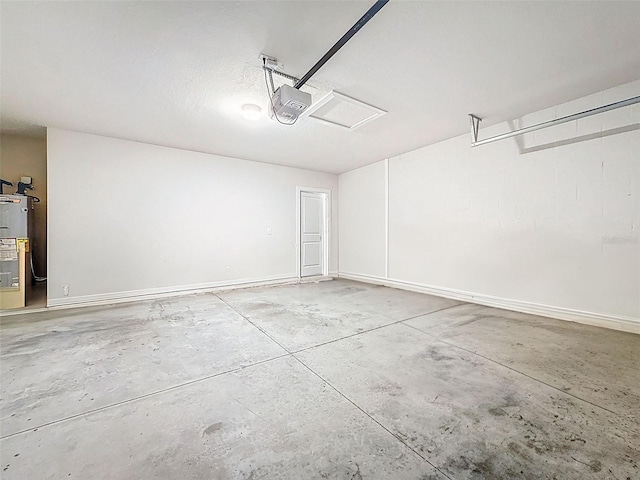 9324 Rally Spring Loop, Wesley Chapel, FL 33545 - garage with water heater and a garage door opener
