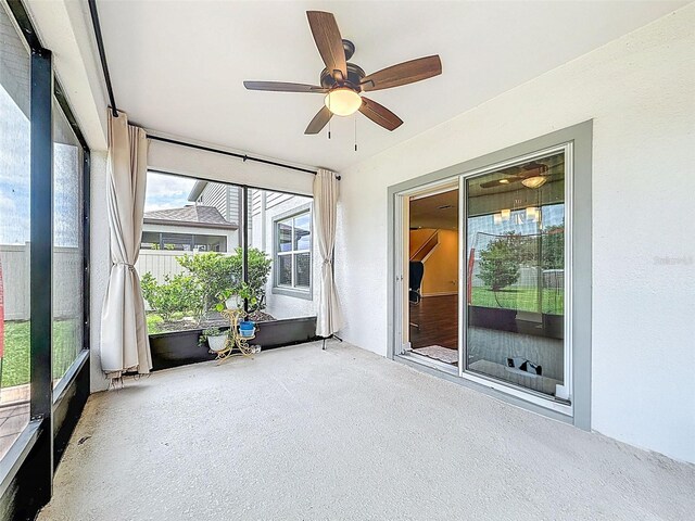 9324 Rally Spring Loop, Wesley Chapel, FL 33545 - unfurnished sunroom featuring ceiling fan