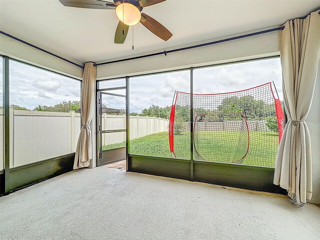 9324 Rally Spring Loop, Wesley Chapel, FL 33545 - unfurnished sunroom featuring a ceiling fan
