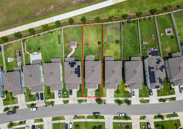 9324 Rally Spring Loop, Wesley Chapel, FL 33545 - aerial perspective of suburban area with property parcel outlined