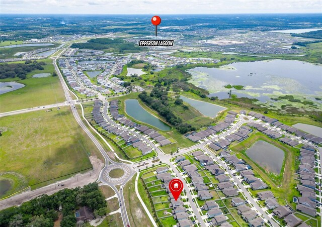 9324 Rally Spring Loop, Wesley Chapel, FL 33545 - aerial view of property's location with a large body of water and nearby suburban area