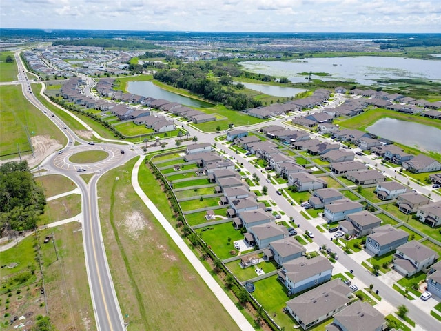9324 Rally Spring Loop, Wesley Chapel, FL 33545 - aerial view of property's location with a large body of water and nearby suburban area
