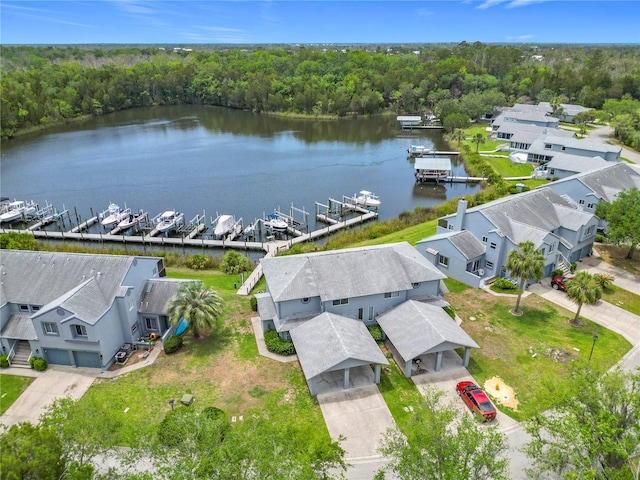 11122 W Cove Harbor Dr Unit 112, Crystal River, FL 34428 - aerial view of residential area with a nearby body of water and a forest